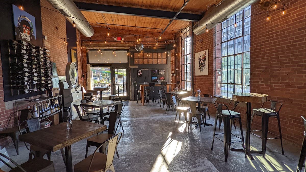 Vin Master daytime interior — brick walls and string lights
