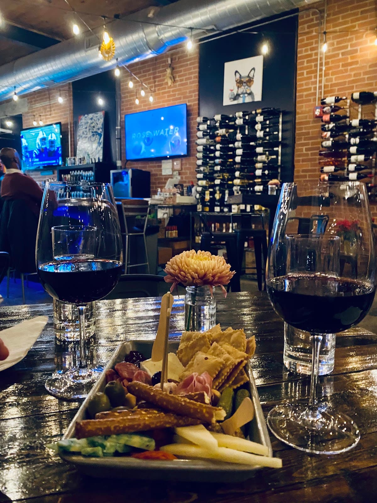 Wine glasses and charcuterie at Vin Master